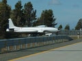 Old military plane in front of Chilean Air Force Chabunco Air Base in Punta Arenas