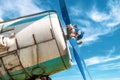 Old military plane propeller. Vintage fighter plane closeup by blue sky