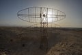 Old military radar aerial abandoned in remote african desert