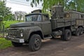 Old military truck parked near an old way.