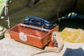 Old military wired phone stands on the table