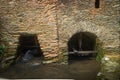 Old mill on the bank of the river Lourido in the park of the fountain of Stanislaus