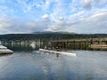 A rowing lesson on the water Teenagers are engaged in sports club They are learning rowing Boathouse rowing sailing