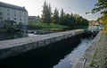 On the Oust River in Brittany, France, an old mill, dam and canal boat lock Royalty Free Stock Photo