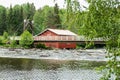 Old mill, dam and threshold on the river Jokelanjoki, Kouvola, Finland Royalty Free Stock Photo