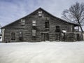 Old Mill at the dam in winter Royalty Free Stock Photo
