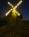 The old mill illuminated. Royalty Free Stock Photo