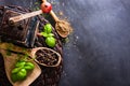 Old mill and wooden spoons with spices Royalty Free Stock Photo