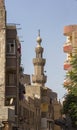 Old minaret of mosque against a bright blue sky,Islamic Cairo, Egypt Royalty Free Stock Photo