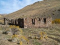 Old mining ruins made of rock in the Nevada desert during autumn
