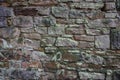Old mixed size stones building wall close up Royalty Free Stock Photo