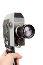 Old 8mm movie camera in hand Royalty Free Stock Photo