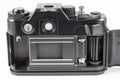 Old 35mm SLR camera with open back cover Royalty Free Stock Photo