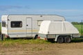 Old mobile home trailer house camper and cargo trailer Royalty Free Stock Photo