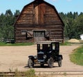 Antique Model Ford With Wooden Barn Royalty Free Stock Photo