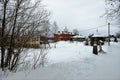 Staraya Ladoga, Russia, January 5, 2019. View of the dilapidated buildings and the restored temple of the female Orthodox monaster