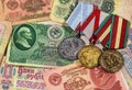 Old Money and medals of the Soviet Union - background with banknotes Royalty Free Stock Photo