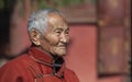 Old mongolian nomad man at a temple