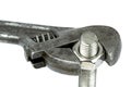 Old monkey wrench and bolt nut Royalty Free Stock Photo