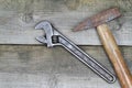 Old monkey wrench and hammer Royalty Free Stock Photo