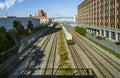 Old Montreal scene of condo bridge Molson Coors trains beside the Saint Lawence seaway