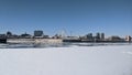 Old Montreal in winter with frozen river