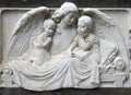 Old monument, angel with children.