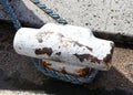 Old mooring bollard in Weymouth Harbor, Dorset. Royalty Free Stock Photo