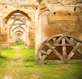 old moroccan gra nary in the green grass and archway wall Royalty Free Stock Photo