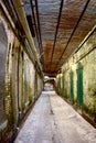 Old moss covered hallway in Alcatraz prison in San Francisco, California Royalty Free Stock Photo