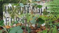 Old moss-covered plaque unsuitable for motor vehicles