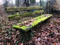 Old mossy weathered wooden bench