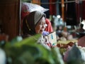 Old mother selling vegetables at the market, Focus old mother