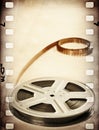 Old motion picture reel with film strip. Vintage background Royalty Free Stock Photo