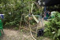 Old motor and big steel fan at outdoor for blowing cool down to travelers people in orchard garden