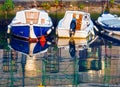 Old motor boat in Trieste canal with calm waters Royalty Free Stock Photo