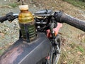 an old motorbike with a modified gas tank using an old bottle Royalty Free Stock Photo