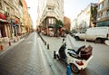 Old motorbike standing between historical buildings