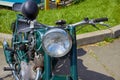 Old motorcycle,Close up shot of a vintage motorcycle headlight and horn Royalty Free Stock Photo