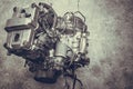 Old motorcycle engine isolate in workshop closeup Royalty Free Stock Photo