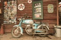 Old motorcycle on wood background, in thailand