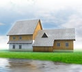 Old mountain cottage with green grass and river Royalty Free Stock Photo