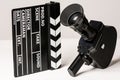 Old movie camera with film clapperboard. Royalty Free Stock Photo