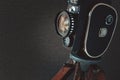 Old movie camera with a lens Royalty Free Stock Photo