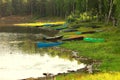 Old multicolored boats lying on the shore Royalty Free Stock Photo