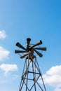 Old multidirectional emergency siren attached to a steel pylon