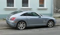 Old muscle car Chrysler Crossfire Coupe silver grey parked Royalty Free Stock Photo