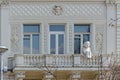 Old museum building with angel on the balcony in Kyiv Ukraine