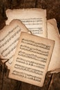 Old Music Sheets On Wooden Background Royalty Free Stock Photo