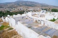 An old Muslim cemetery, overlooking the city of Fez in Morocco, with decorated tombstones and graves